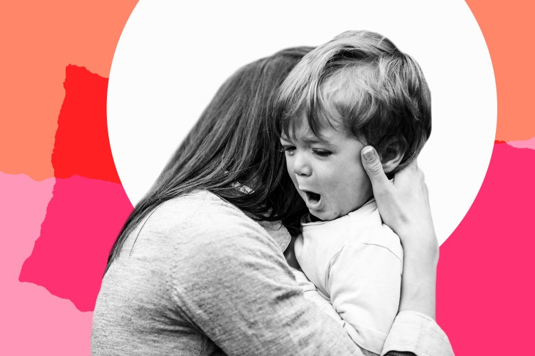 A mother comforts a wailing child.